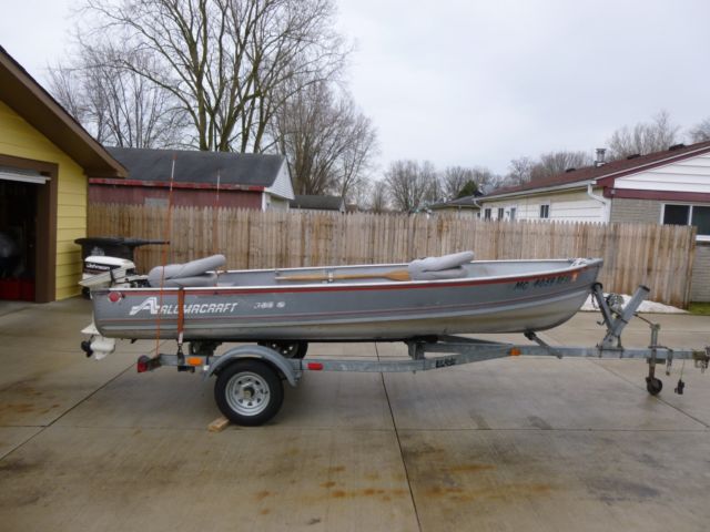 14' alumacraft 1994 boat, with trailer,15 horse outboard